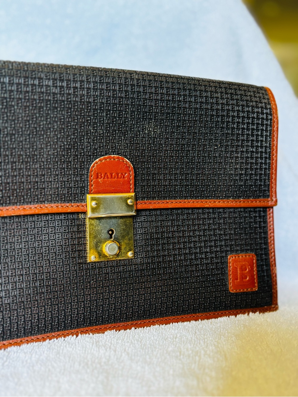 Bally Black Leather Wristlet with Brown Leather Trim and Brass Lock Accent - Picture 2 of 9